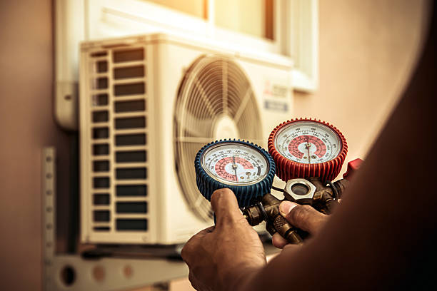 Professional Heat Pump Repair technician working in Pleasureville, PA